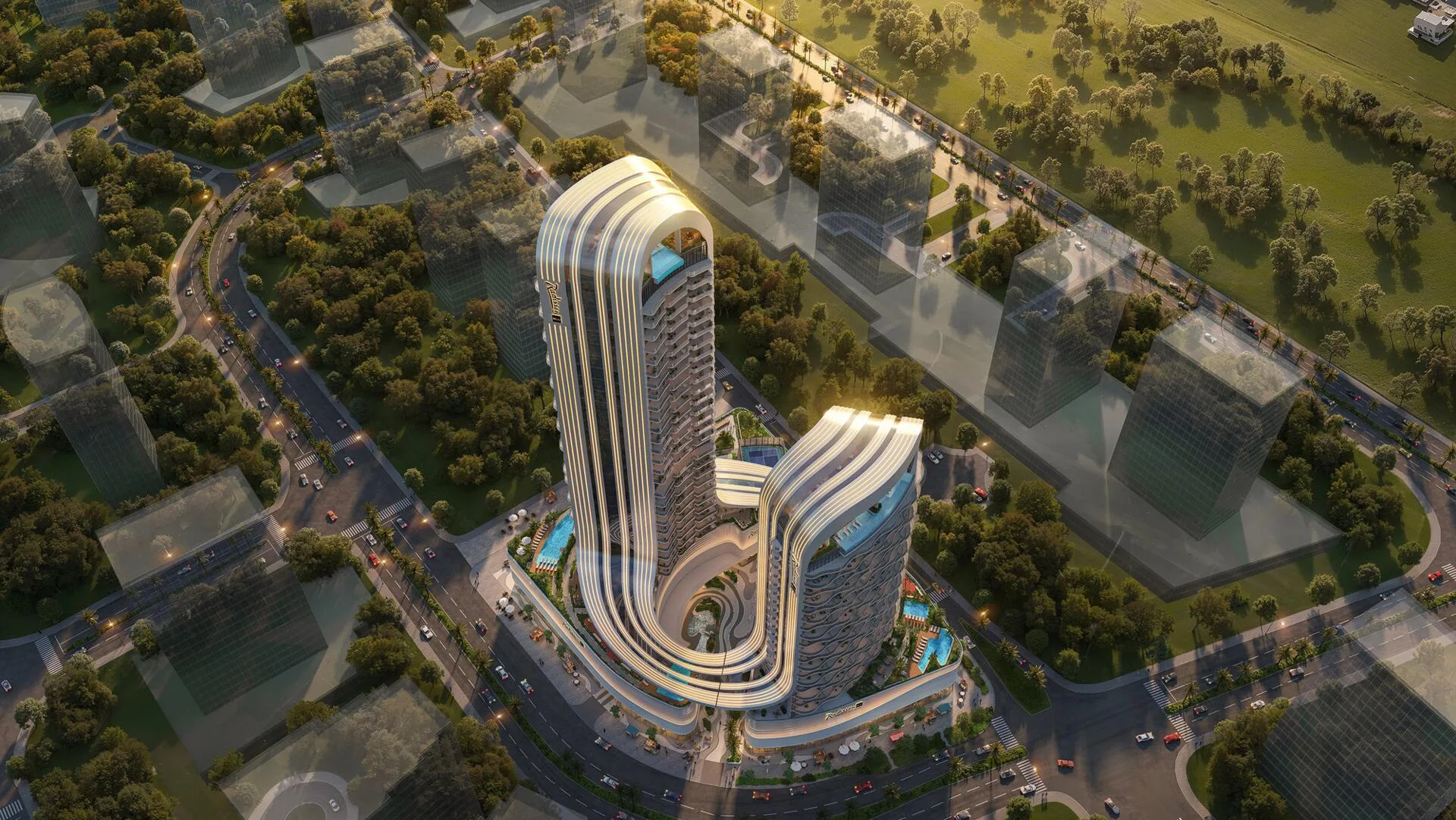 Комплекс Radisson Blu RAK Central с высоты на закате