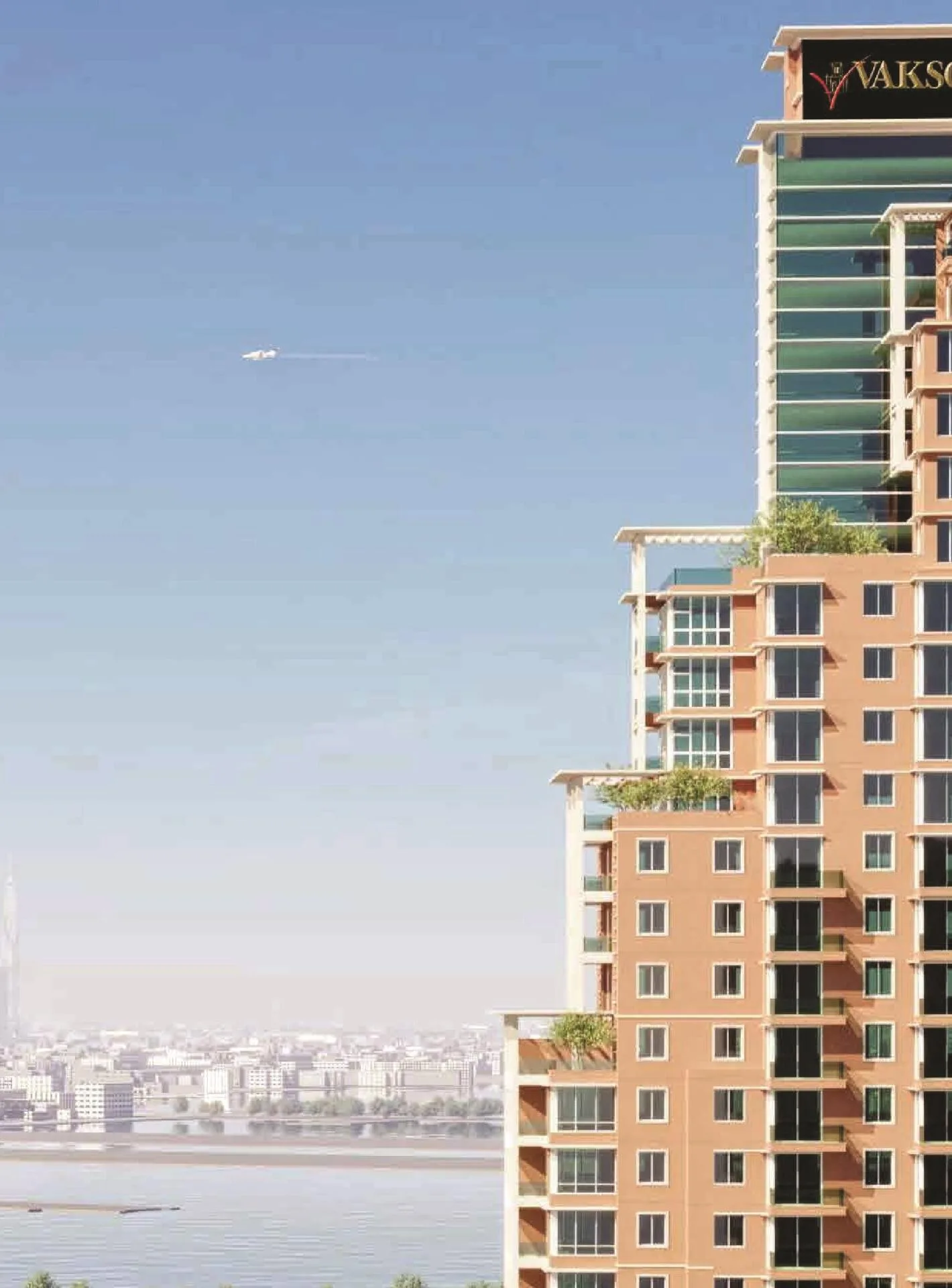 Верхние этажи Riva Residence с озеленёнными террасами и видом на город