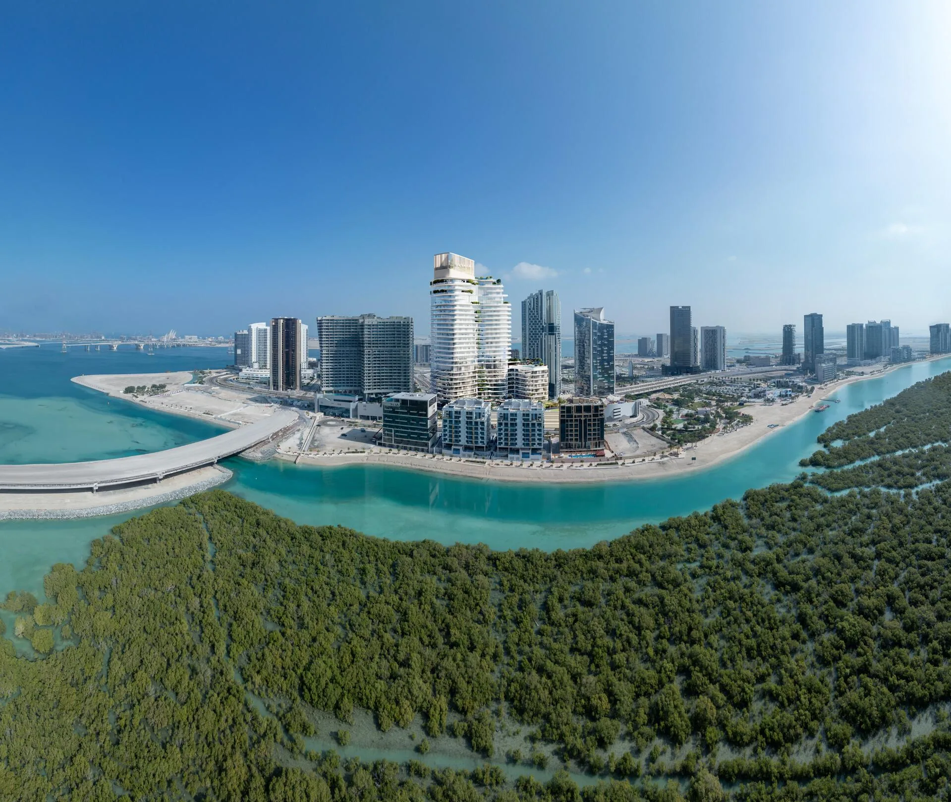 Берег острова Аль-Рим с Rivage среди башен, мост и заросли у воды
