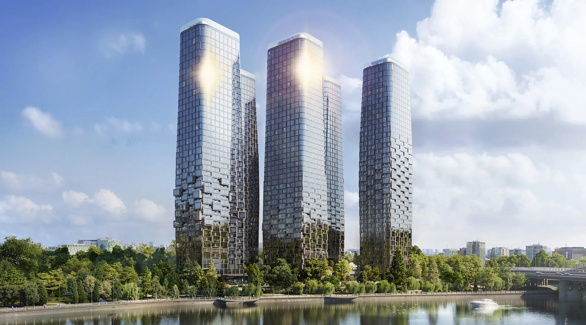 Башни комплекса днём у Москвы-реки, вид с воды