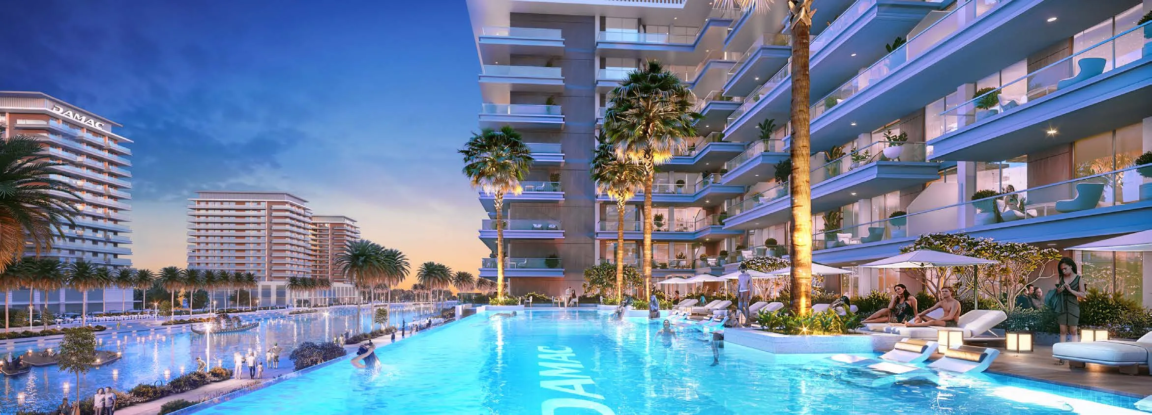 Бассейн у корпусов Riverside Views вечером, шезлонги и пальмы