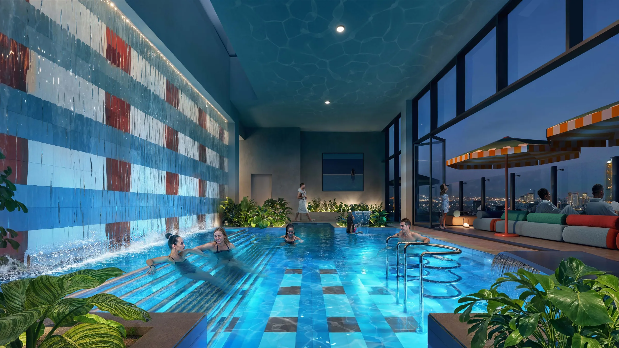 Vitality Pool вечером: бассейн у стены с водой и терраса с видом на город