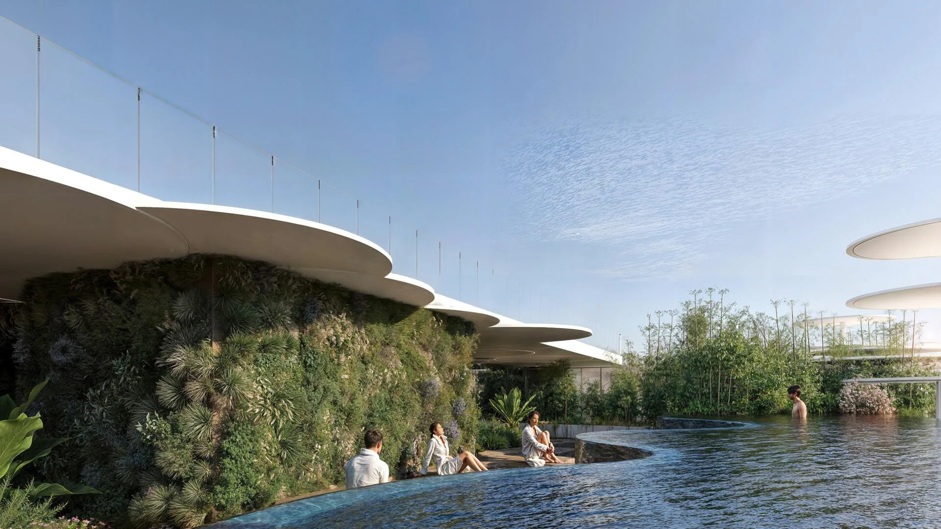 Бассейн-инфинити Sakura Gardens с зелёной стеной