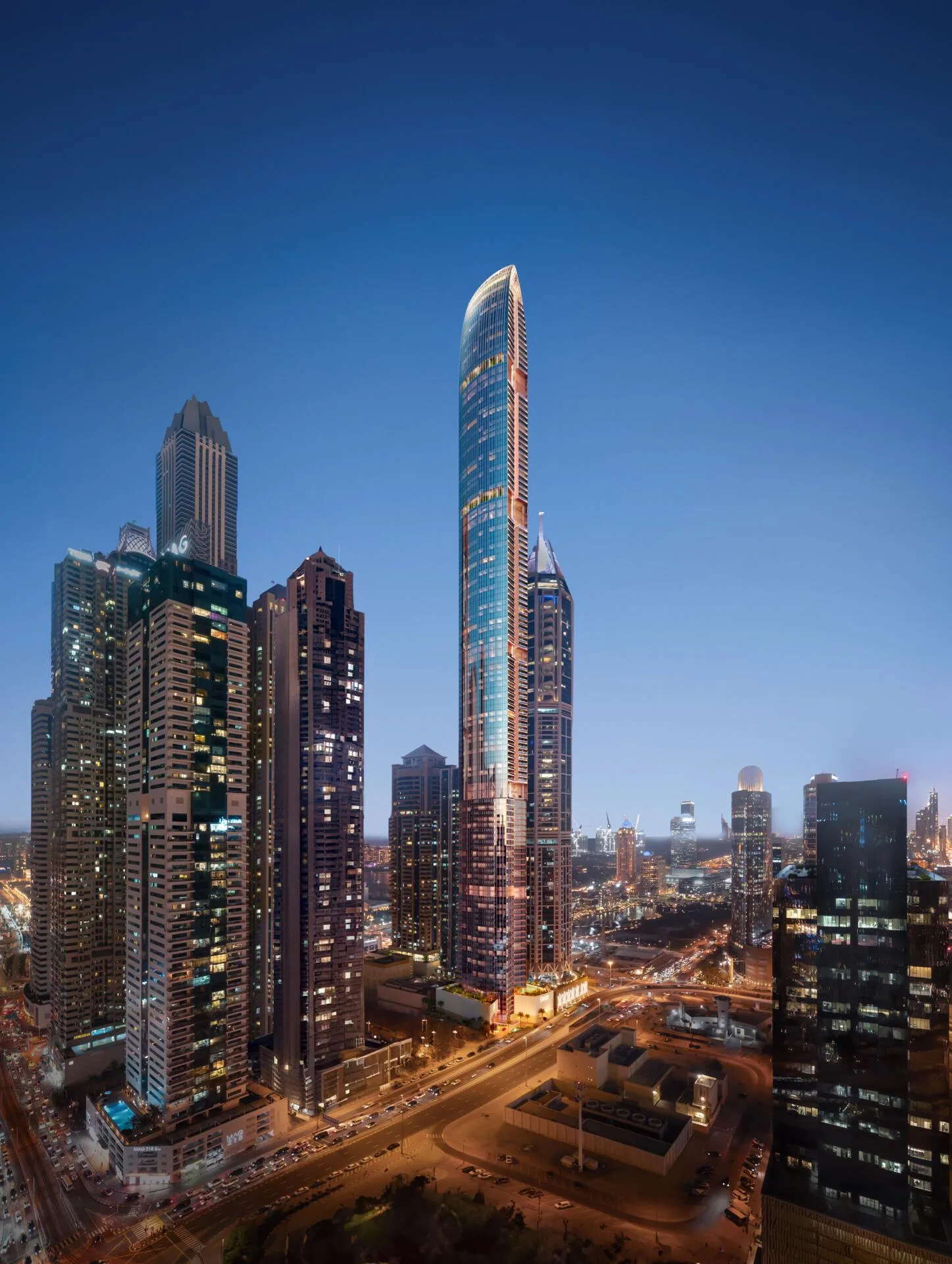 Башня Six Senses Residences Dubai Marina ночью над огнями города
