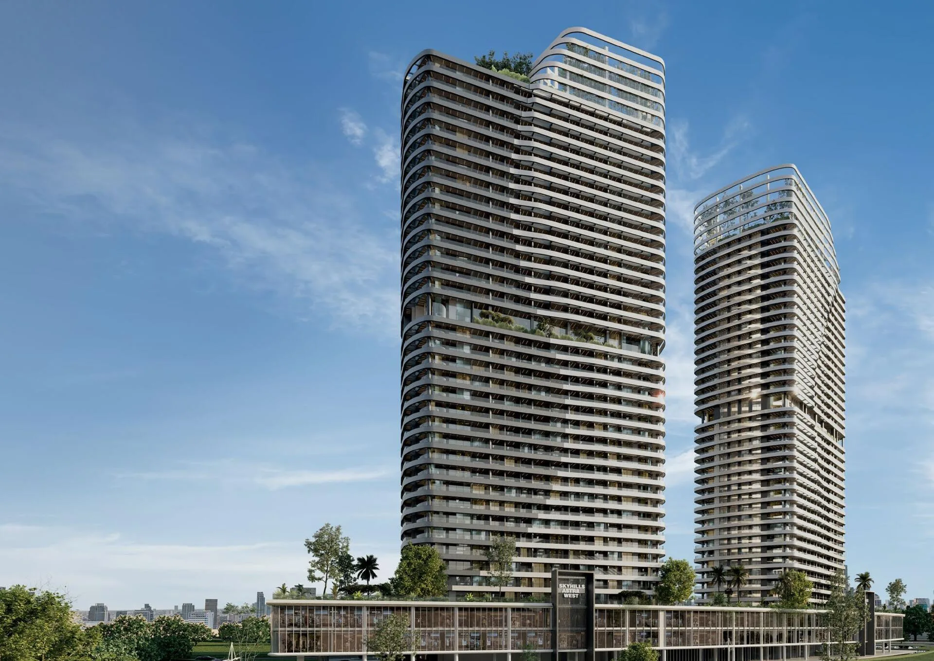Две башни SkyHills Astra над подиумом днём