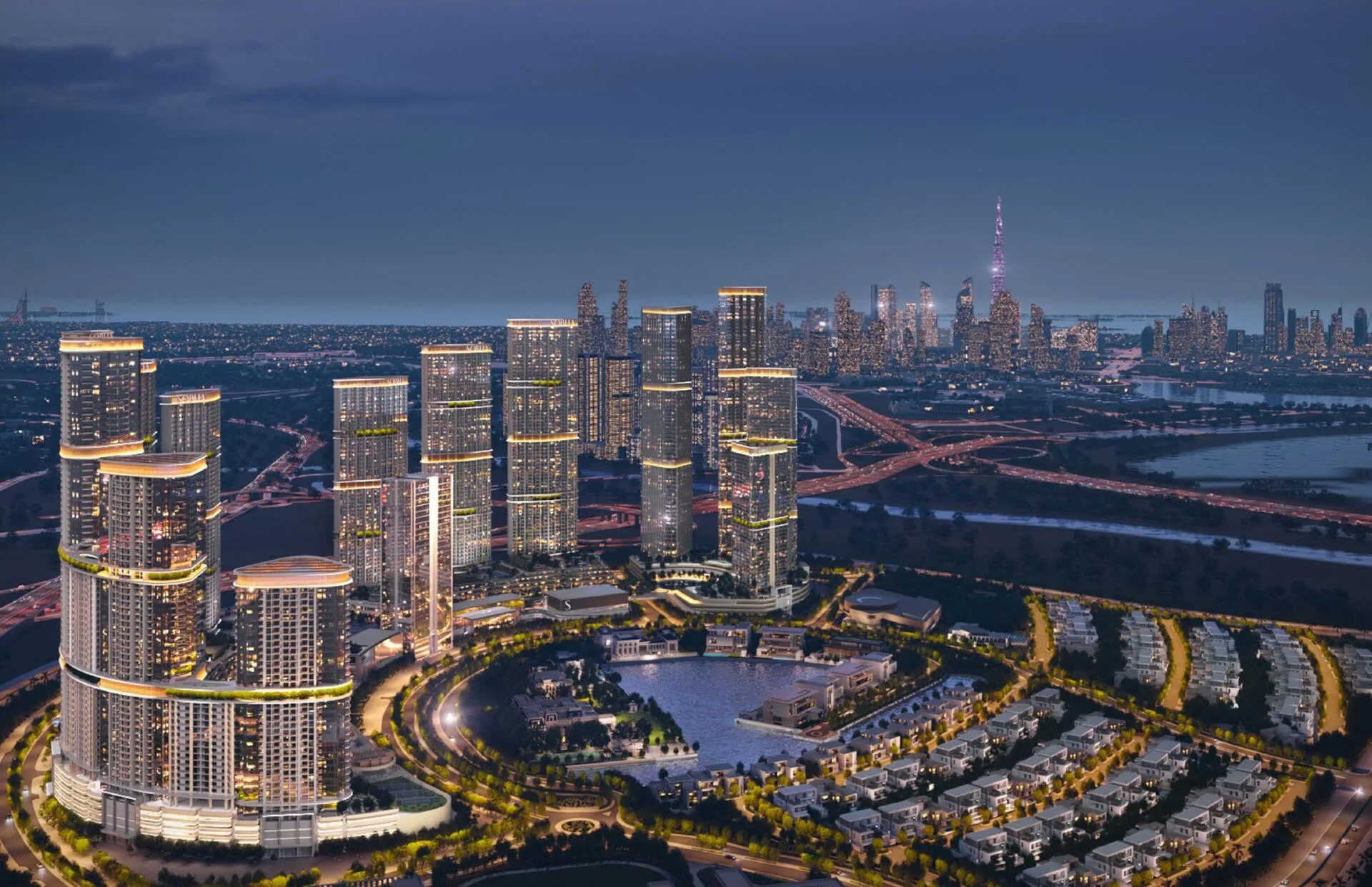 Башни Sobha Hartland II и Downtown Dubai ночью