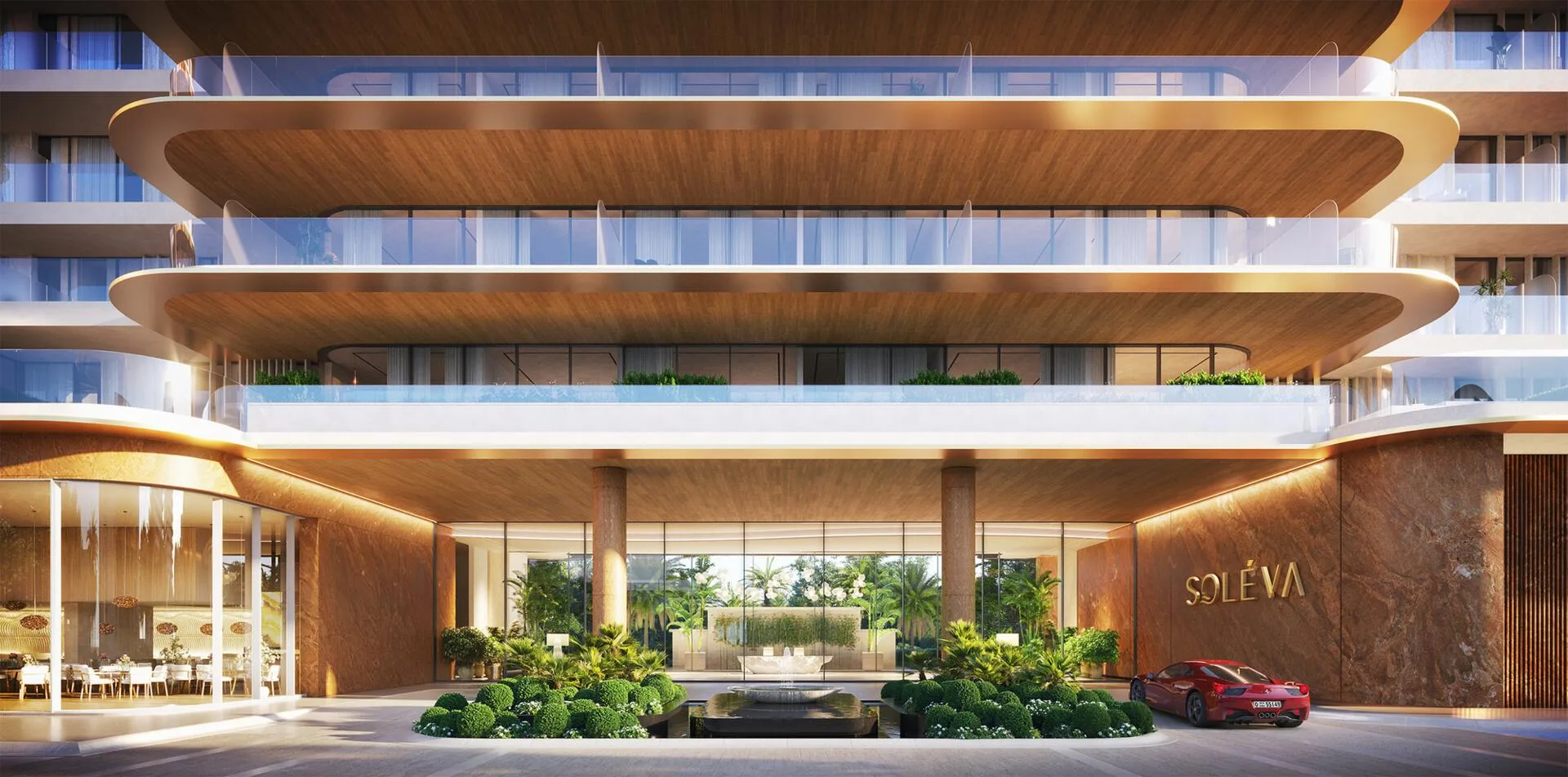 Вход в Soléva Beach Residences с именем дома