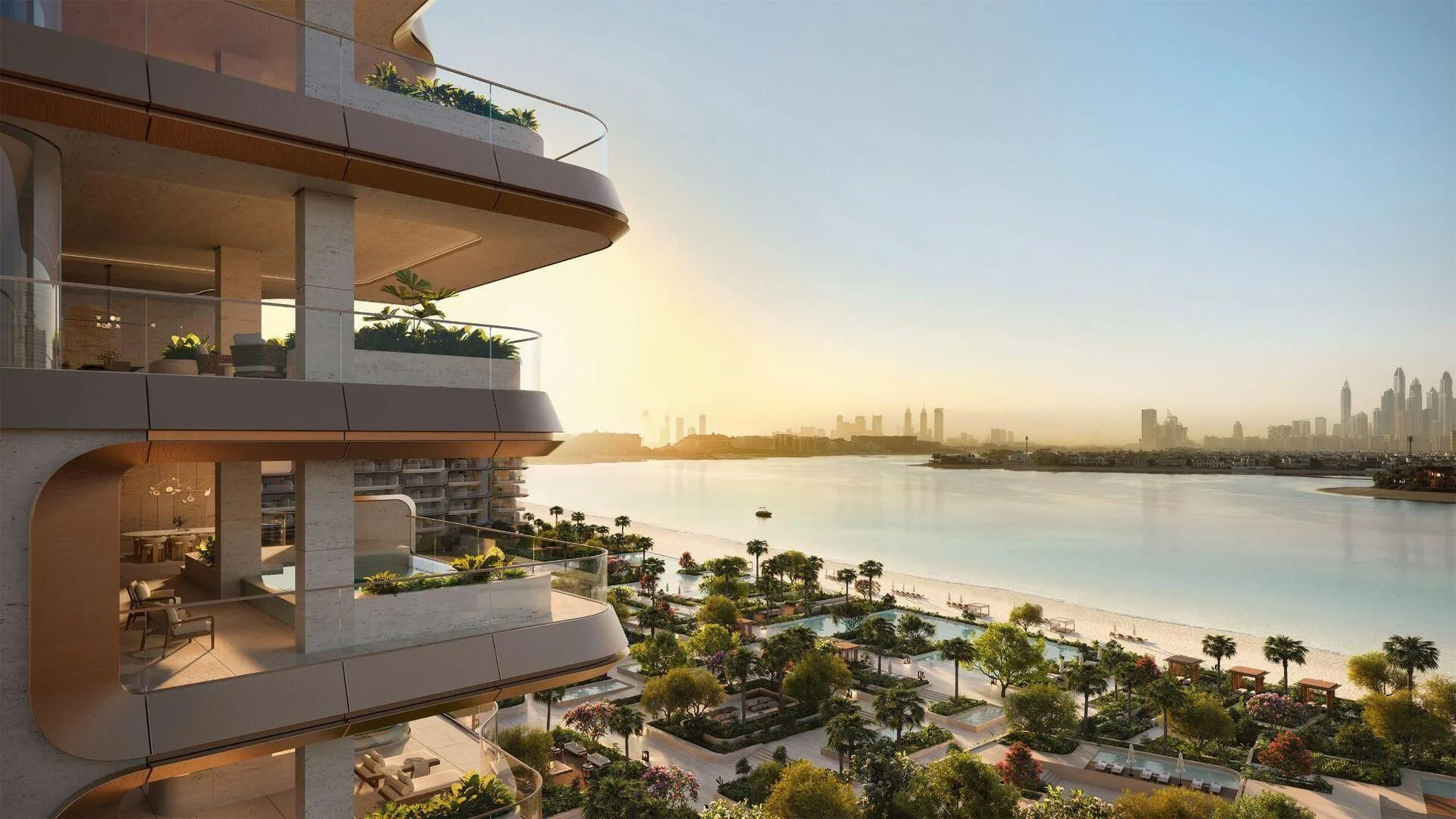 Вид с балкона The Alba Residences на сад, пляж и город