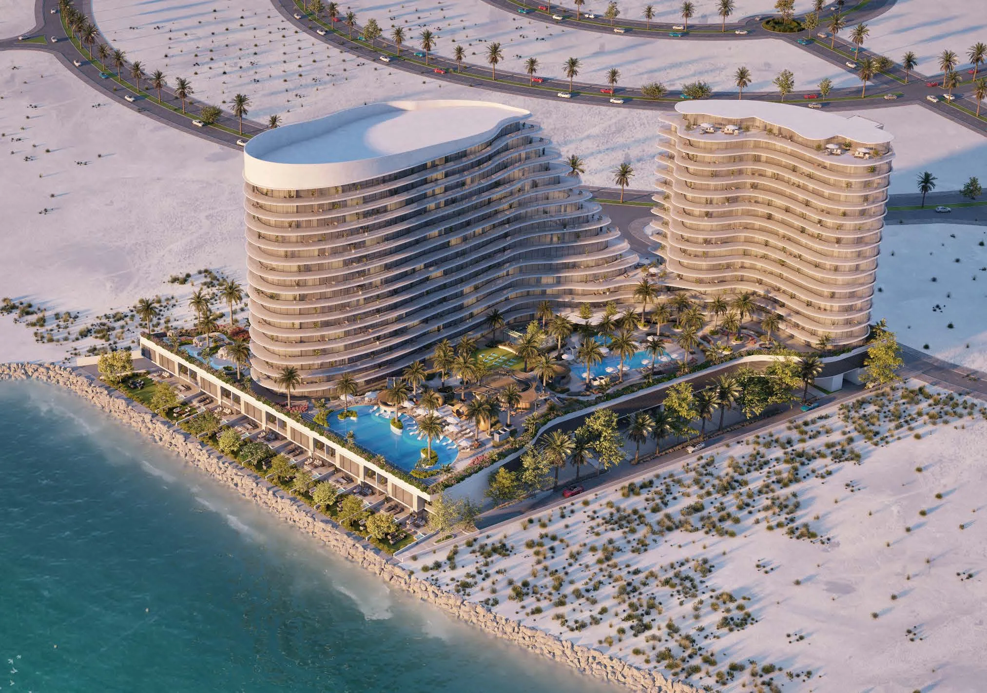 Башни The Beach Residences у моря с высоты: бассейны и пальмы у берега