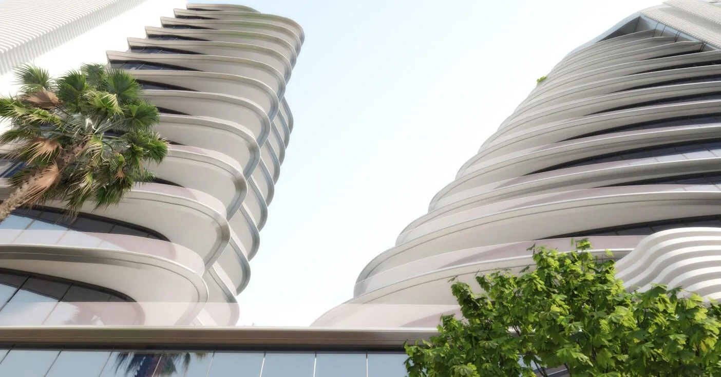 Волнистые фасады двух башен The Beach Residences снизу