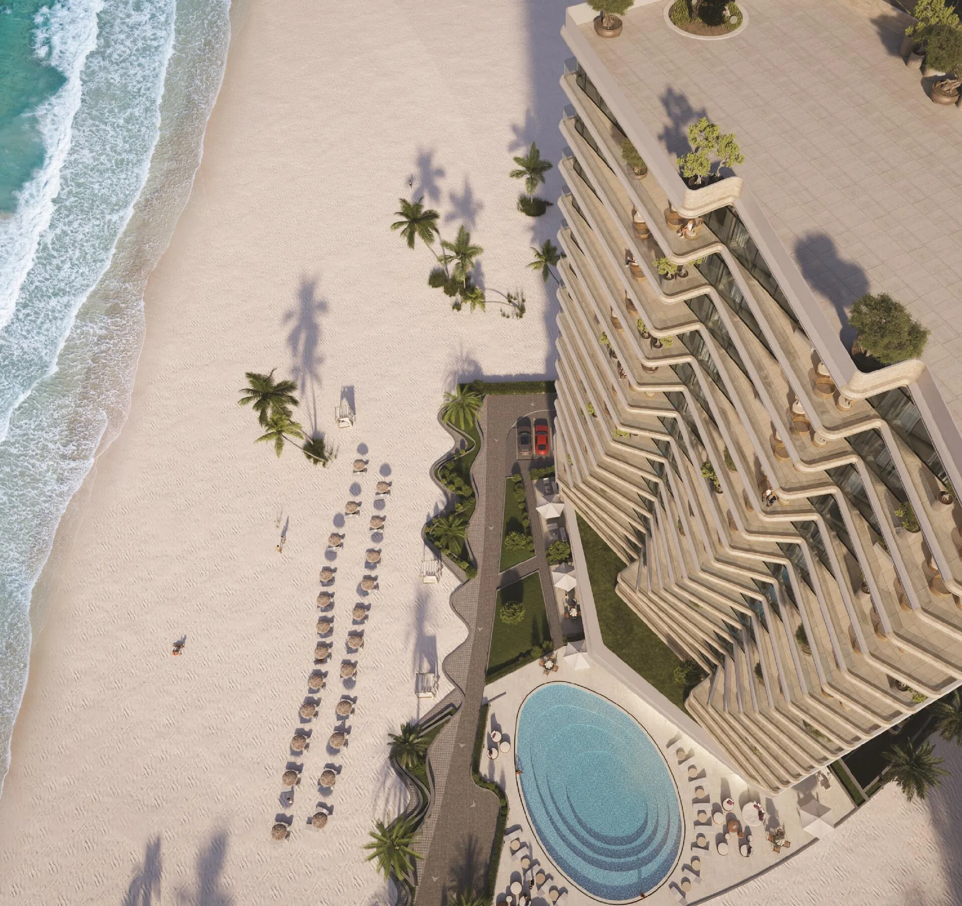 Бассейн The Beach Vista сверху: круглая чаша у террас башни и пляж с зонтиками