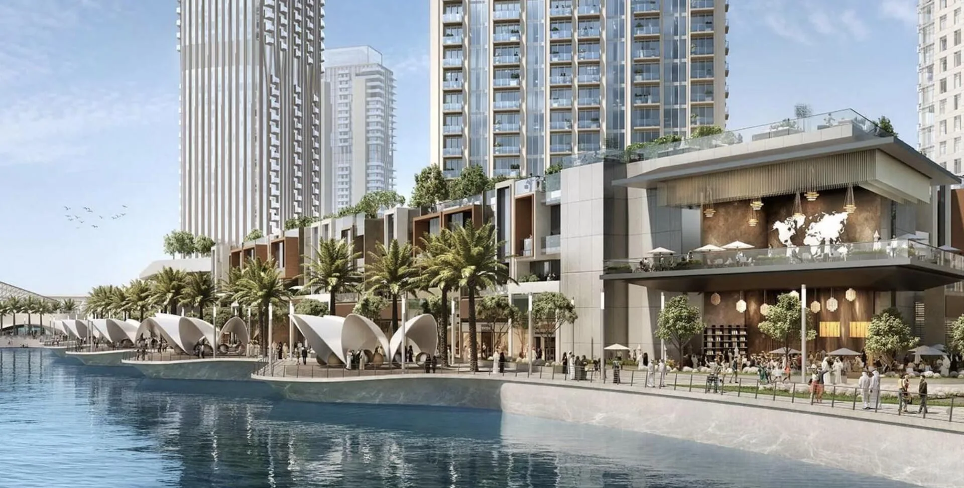 Прогулочная набережная Dubai Creek Harbour с кафе и пальмами