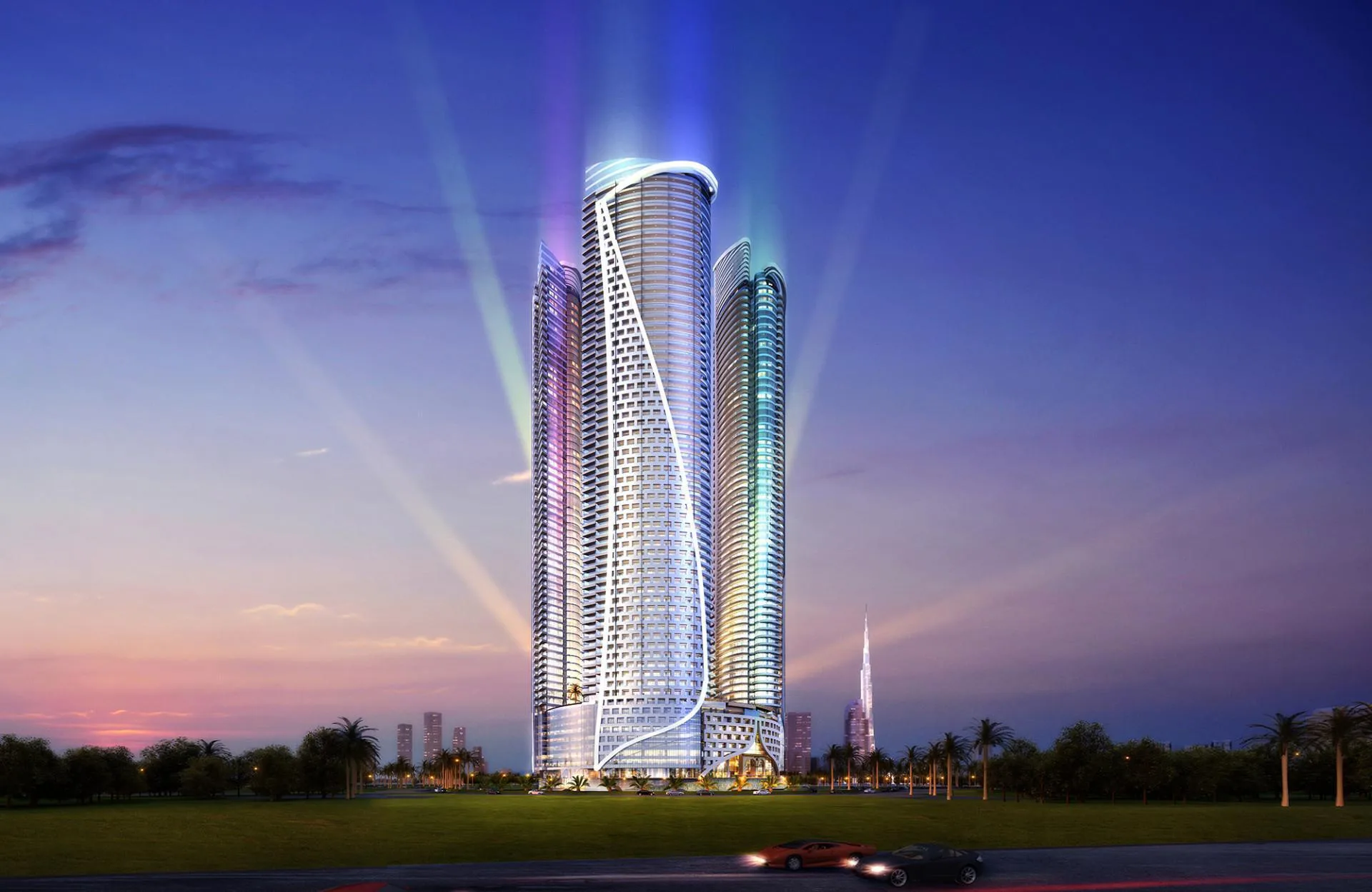Башни DAMAC Towers ночью в лучах прожекторов