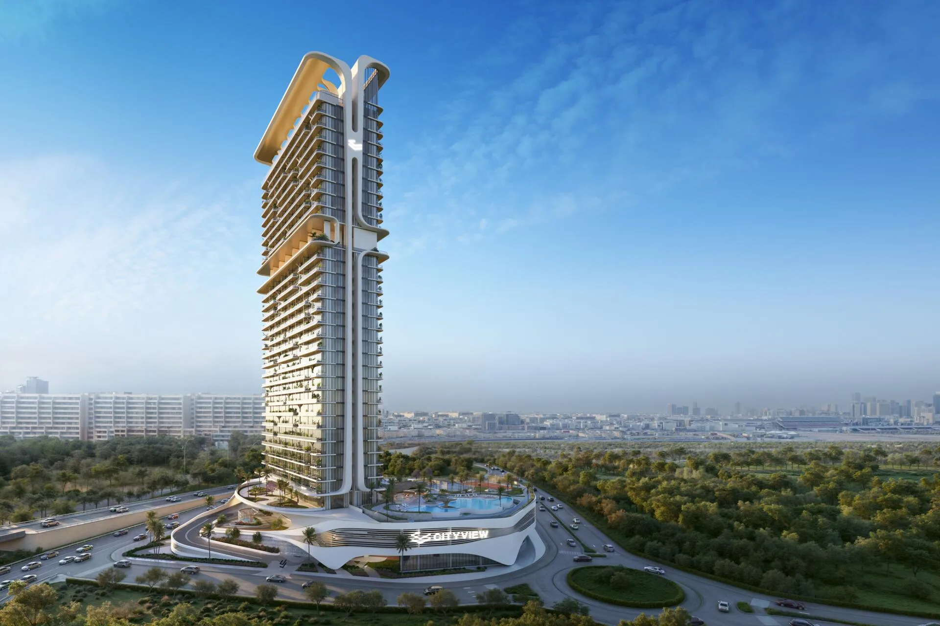Башня Velos Residences над дорогами и зеленью Motor City на закате