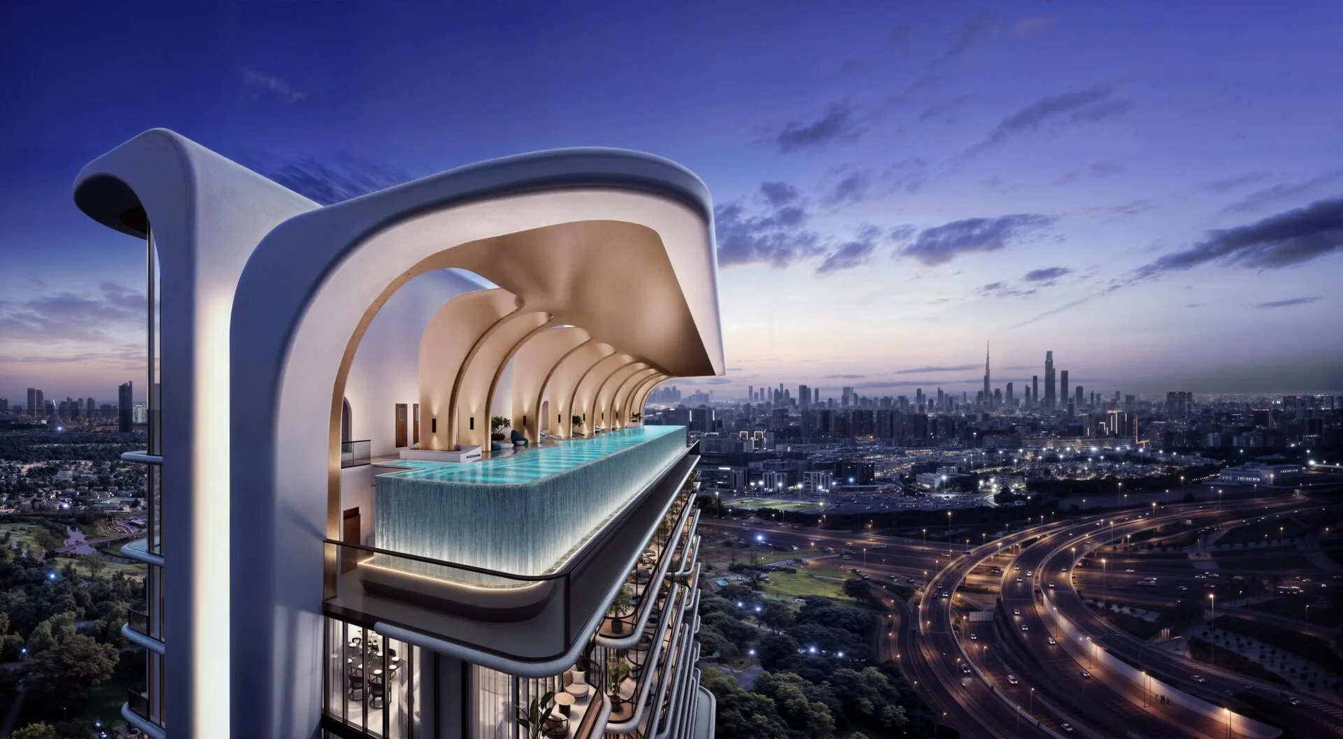 Бассейн на крыше вечером, вдали огни Downtown Dubai