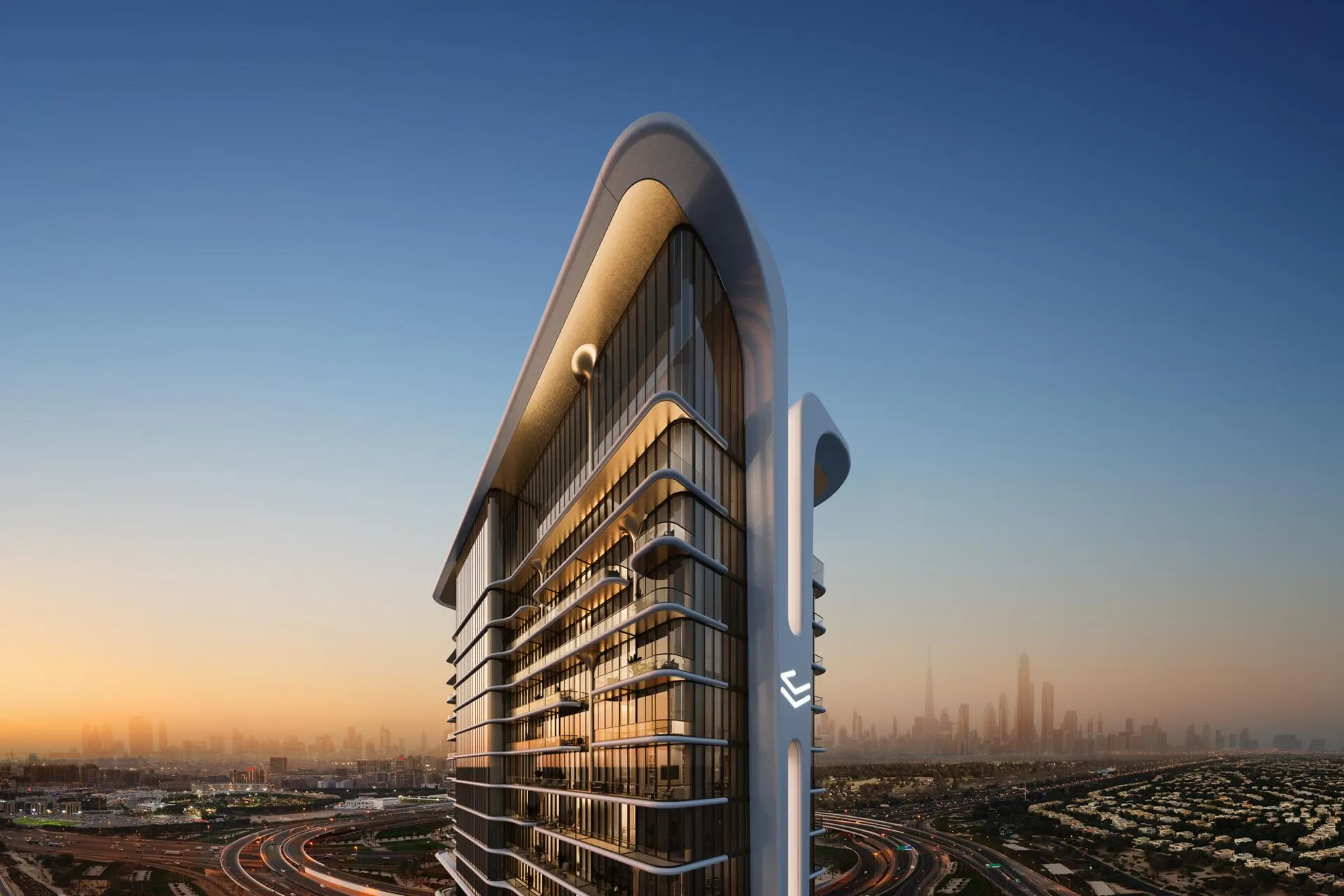 Верх башни Velos Residences на закате, вдали Downtown Dubai