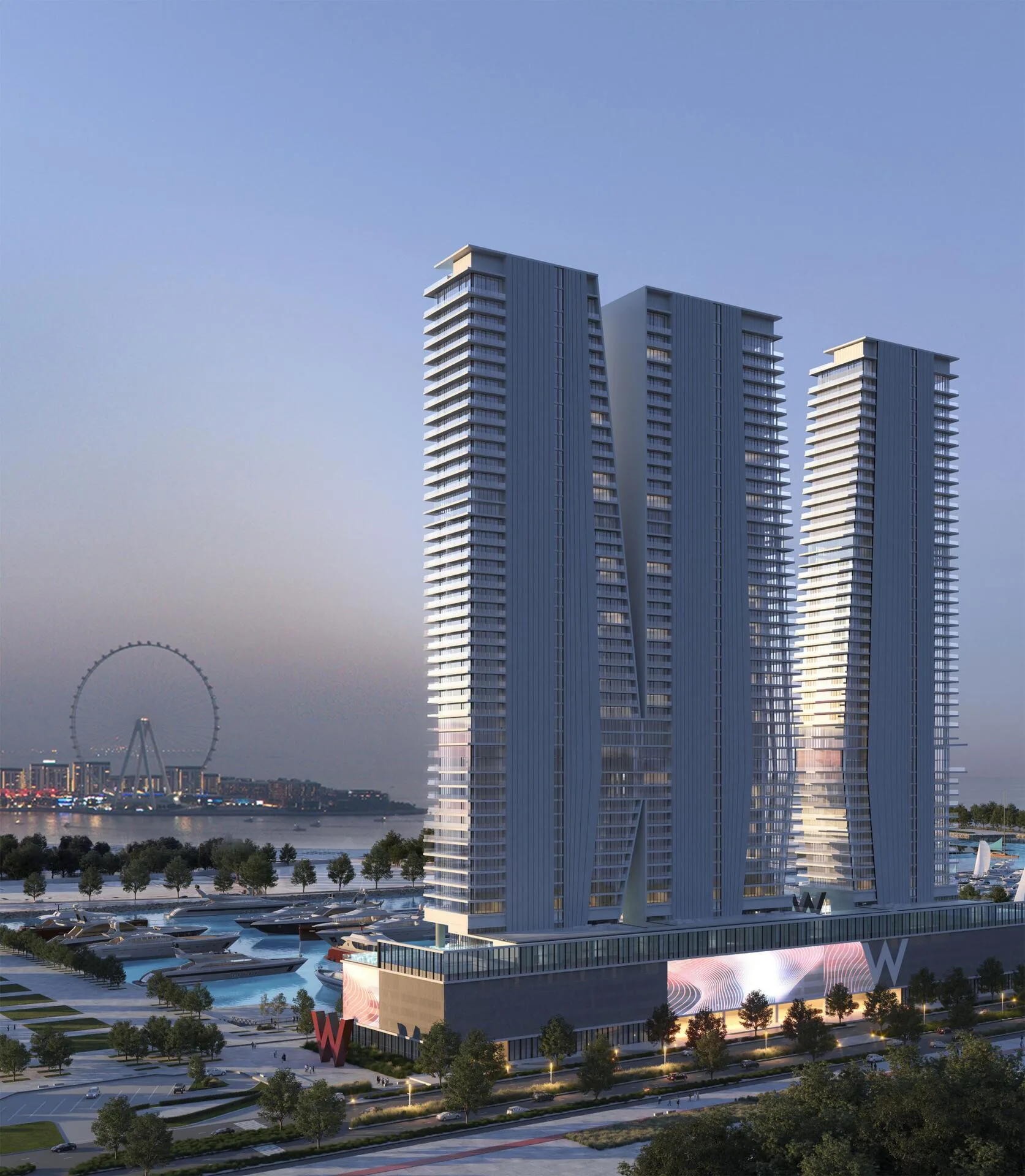 Башни W Residences с колесом обозрения на заднем плане