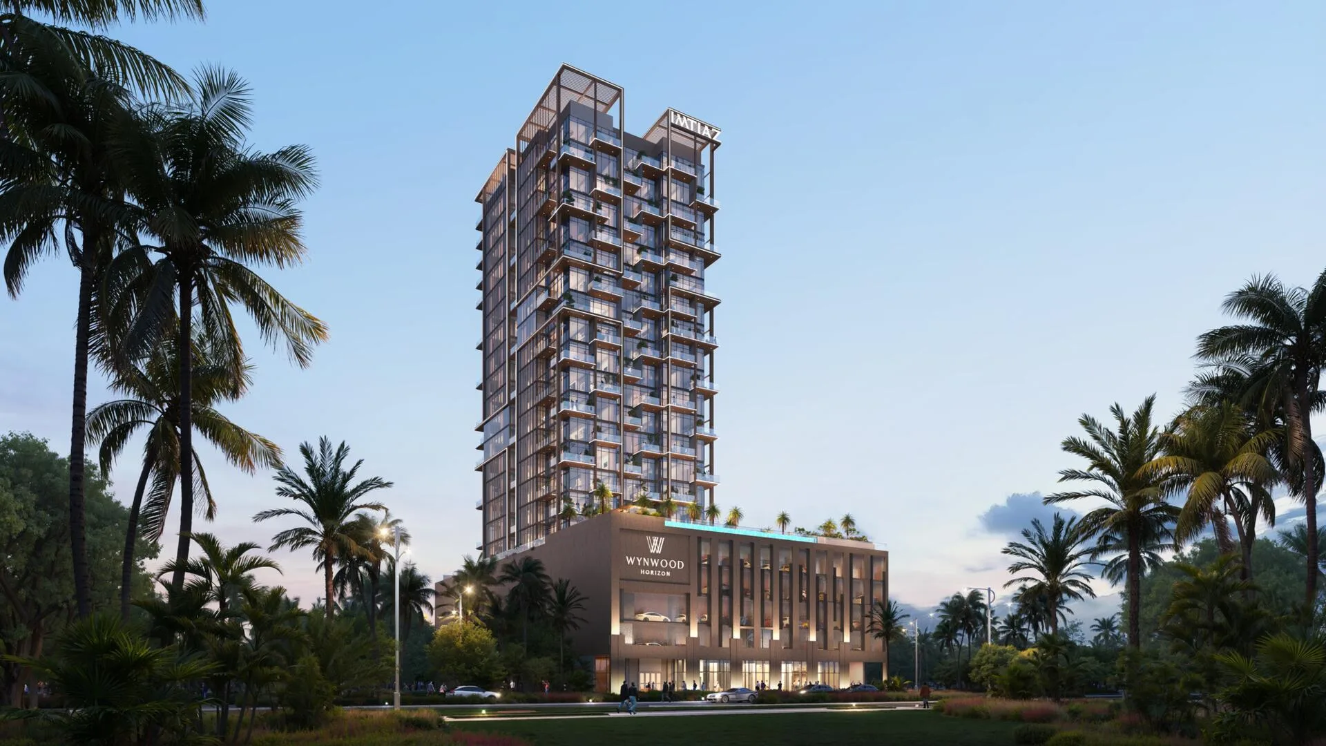 Башня Wynwood Horizon в сумерках среди пальм
