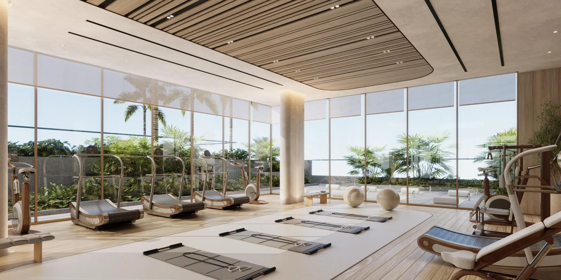 Спортзал Wynwood Horizon с тренажёрами у окон в зелень