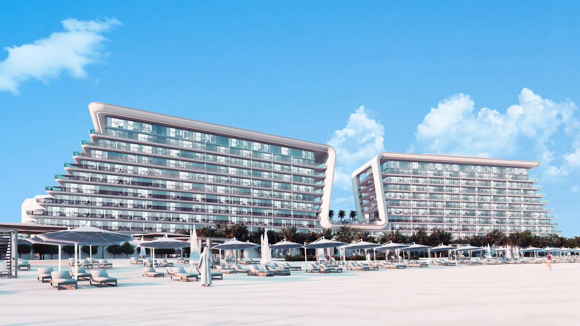Пляж с зонтами перед Yas Beach Residence